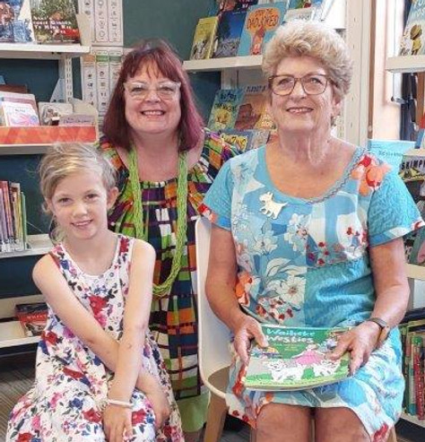 Sally Ewins with attendees at the Waiheke Westies book launch